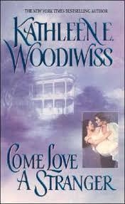 COME LOVE A STRANGER | 9780380899364 | KATHLEEN E. WOODIWISS