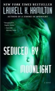 SEDUCED BY MOONLIGHT | 9780345443595 | LAURELL K HAMILTON