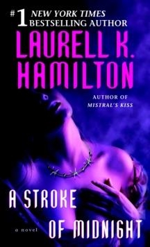 A STROKE OF MIDNIGHT | 9780345443601 | LAURELL K HAMILTON